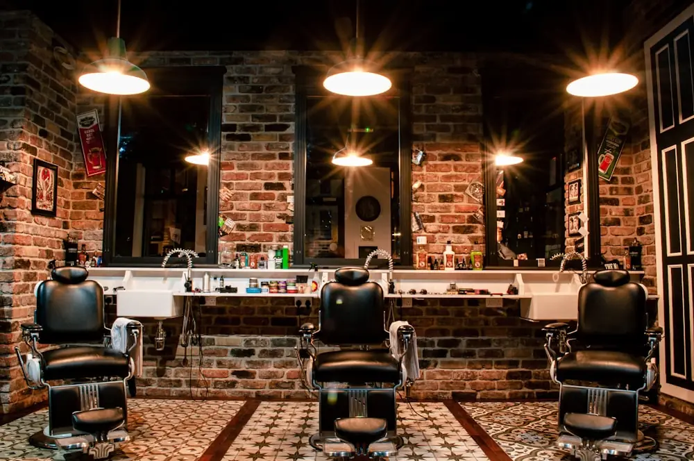 Leather chairs and mirrors inside a barbershop